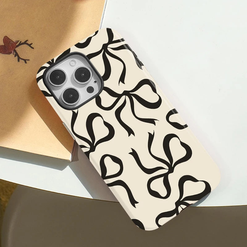 Black Ribbon Bow Print Phone Case for iPhone 16, 15 & 14 Series - Cream Magnetic Dual-Layer PC and TPU Cover